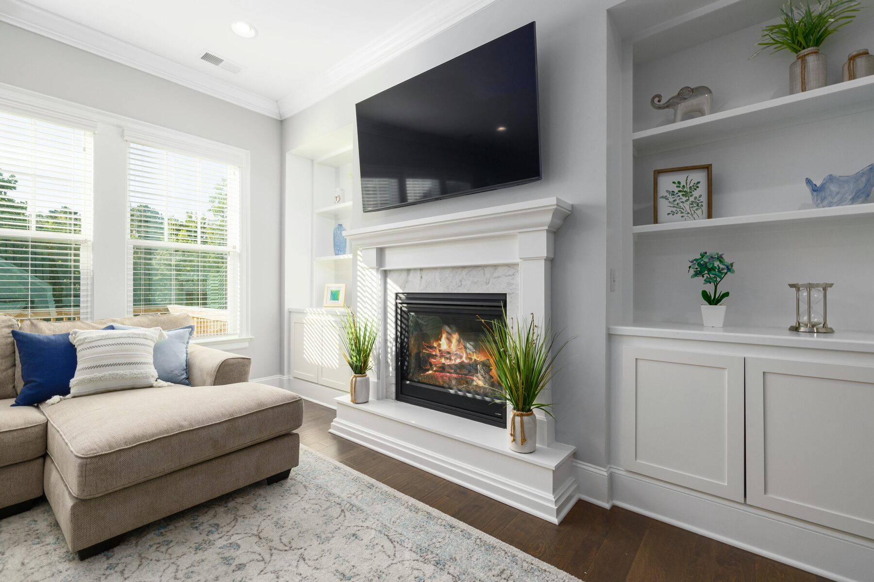 Family room with fireplace and natural light